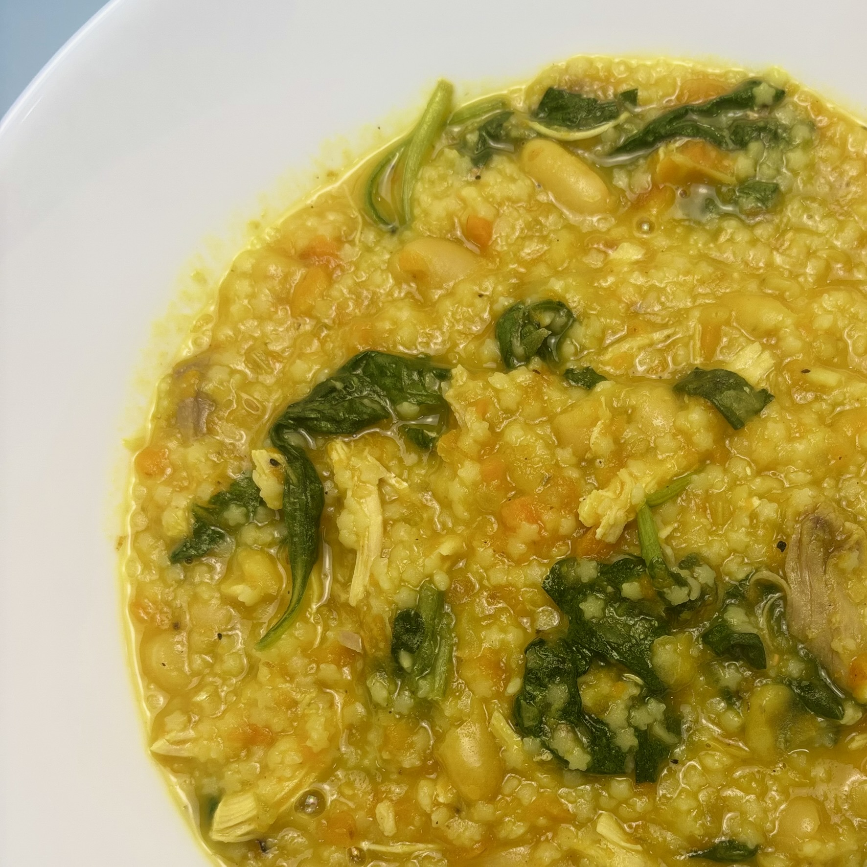 Sick Day Chicken Pastina Soup with chicken, white beans, spinach, carrots, and pastina